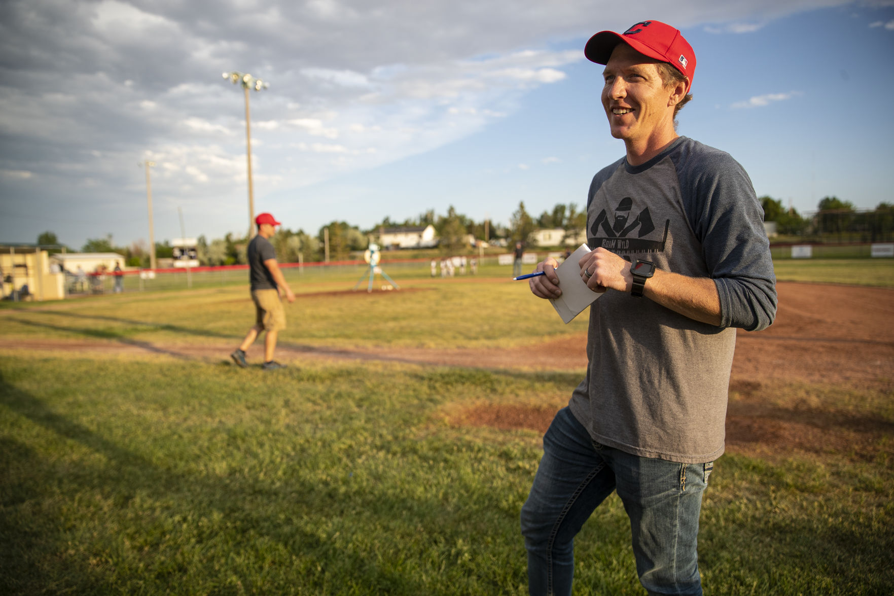 Law enforcement pair coach their sons in little league baseball